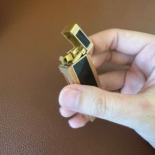 Bật lửa Dunhilll bọc vàng phũ men đen