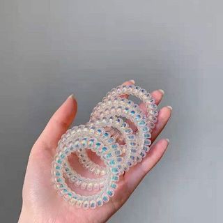 CỘT TÓC LÒ XO HOLOGRAM