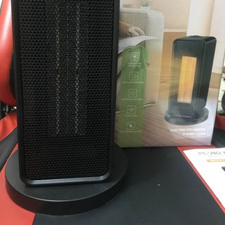 Quạt sưởi gốm 2 chiều 1200w
