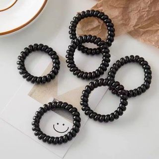 CỘT TÓC LÒ XO ĐEN TO