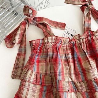 Áo babydoll hai dây kẻ caro đỏ, áo 2 dây chun ngực thắt nơ vai viền bèo tầng tiểu thư. giá sỉ - giá bán buôn