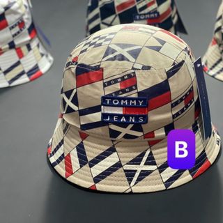 Mũ bucket in,thêu chữ tom my CQ