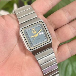 Đồng Hồ Seiko Pin Mặt Vuông