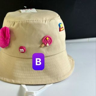 Mũ bucket trẻ em đính những viên kẹo CQ