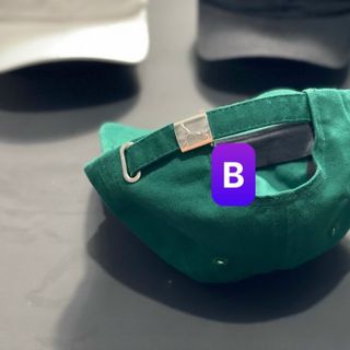 Nón lưỡi trai thêu chữ pu ma màu xanh lá CQ