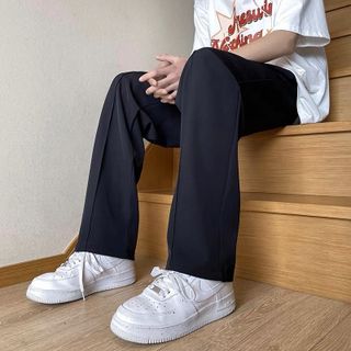 Quần kaki thun form suông dập ly giữa đen basic