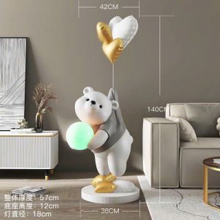 Tượng gấu ôm bóng