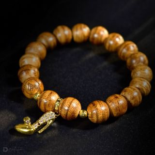 Vòng Tay Trầm Hương Thiên Nhiên Phong Thủy 10 li mix charm kiểu Cao Cấp