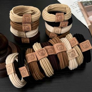 CỘT TÓC THUN GÂN TAG GẤU