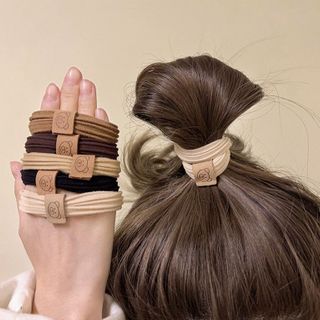 CỘT TÓC THUN GÂN TAG GẤU