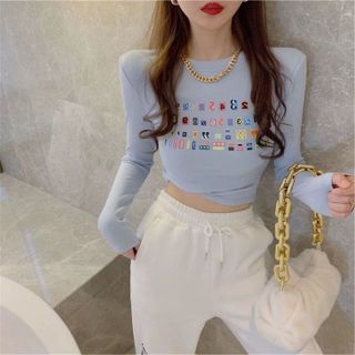 ÁO KIỂU HỌA TIẾT CHỮU MÀU TAY DÀI THUN GÂN TĂM LẠNH - LÊ PHƯƠNG BOUTIQUE