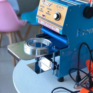 Máy ép miệng ly eton D7