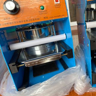 Máy ép miệng ly IC27