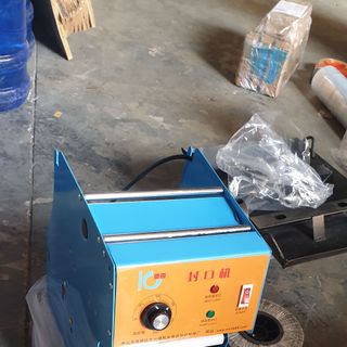 Máy ép miệng ly IC27
