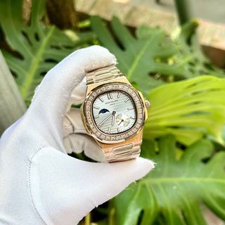 Patek philipe nautilus - size 40mm - Viền đá baguette Máy cơ nhật Mời anh em