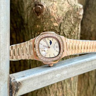 Patek philipe nautilus - size 40mm - Viền đá baguette Máy cơ nhật Mời anh em