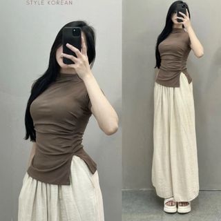 Áo cổ lọ xẻ tà bên