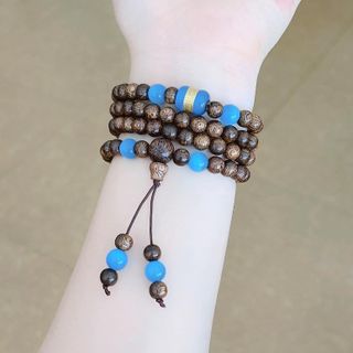VÒNG TAY TRẦM HƯƠNG TỐC THIÊN NHIÊN 108 HẠT PHỐI LU THỐNG GIÁC VÀNG 24KARA - THẮNG GIANG