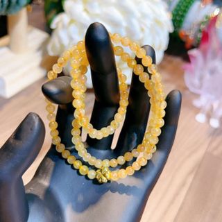 VÒNG TAY THẠCH ANH TÓC VÀNG THIÊN NHIÊN PHỐI CHARM CỎ BỐN LÁ VÀNG TÂY 10 KARA - THẮNG GIANG
