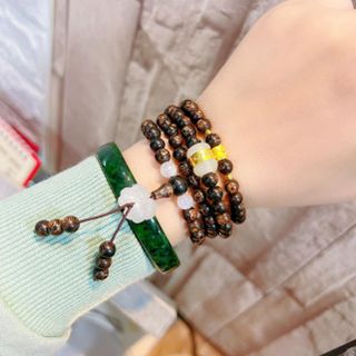 VÒNG TAY TRẦM SÁNH CHÌM PHỐI CHARM VÀNG TAY 24 KARA VÀ CẨM THẠCH - THẮNG GIANG
