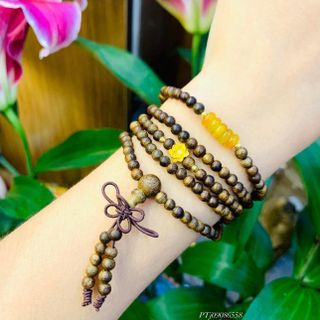 VÒNG TAY TRẦM HƯƠNG TỐC THIÊN NHIÊN PHỐI NGŨ ĐIẾU MINI CHARM BẠC TA XI VÀNG - THẮNG GIANG