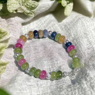 VÒNG TAY BÁNH XE NGỌC THIÊN NHIÊN PHỐI CHARM BẠC TA - THẮNG GIANG