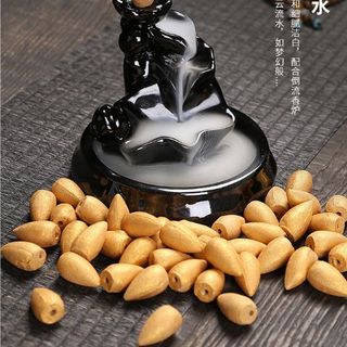 Nhang nụ Trầm hương khói ngược có nhũ vàng 1 gói 100 viên sử dụng cho thác khói. Hương thơm thiên nhiên không hương liệu.