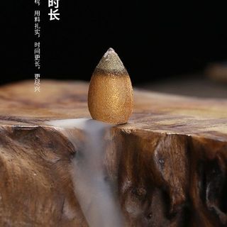 Nhang nụ Trầm hương khói ngược có nhũ vàng 1 gói 100 viên sử dụng cho thác khói. Hương thơm thiên nhiên không hương liệu.