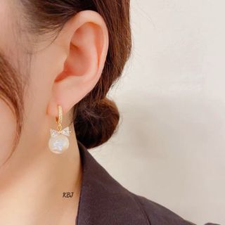 BÔNG TAI NƠ GẮN TRAI SAN HÔ CÓ THẺ HÓA ĐƠN - THẮNG GIANG