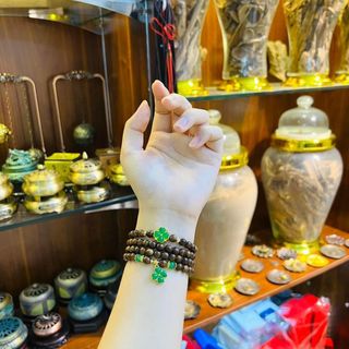 VÒNG TAY TRẦM TỐC PHỐI CHARM CỎ BỐN LÁ XI TĨNH ĐIỆN - THẮNG GIANG