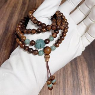 VÒNG TAY TRẦM HƯƠNG TỐC THIÊN NHIÊN PHỐI CỎ BỐN LÁ LAM NGỌC - THẮNG GIANG