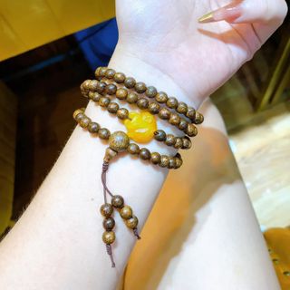 VÒNG TAY TRẦM HƯƠNG TỐC HỒ LY ÔM HOA CẨM THẠCH THIÊN NHIÊN - THẮNG GIANG