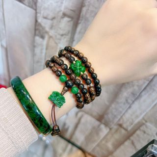 VÒNG TAY TRẦM HƯƠNG SÁNH CHÌM PHỐI CỎ BỐN LÁ SEN NGỌC CẨM THẠCH SƠN THỦY THIÊN NHIÊN - THẮNG GIANG
