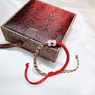 VÒNG TAY LU THỐNG NGỌC GIÁC VÀNG 24 KARA TẾT CHỈ NGŨ SẮC - THẮNG GIANG