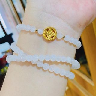 VÒNG TAY THẠCH ANH TRẮNG PHỐI CHARM BÁNH XE PHÁP LUÂN BẠC TA XI VÀNG 24 KARA - THẮNG GIANG