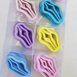 Kẹp sao tim nơ hộp 50cái e