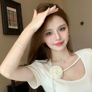 ÁO CỔ TRÒN ĐÍNH HOA CHẤT TĂM LẠNH - LÊ PHƯƠNG BOUTIQUE