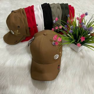 Mũ lưỡi trai đủ mẫu chữ hoặc hình ở một bên NK
