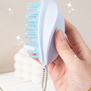 Lược massage silicon hình quả khế