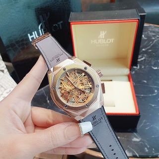 ĐỒNG HỒ NAM TRUNG CẤP HUB MẶT TRÒN GIẢ CƠ DÂY DA 3