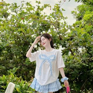 Set áo tay lỡ đính nơ bèo, chân váy sọc xanh trắng