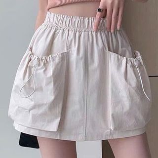 CHÂN VÁY KAKI CÓ TÚI RÚT CÓ QUẦN BÊN TRONG - NHƯ Ý BOUTIQUE