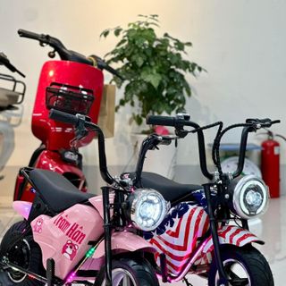 Xe máy điện cucake dành cho các bé cả bé trai và bé gái từ 4 - 12 t