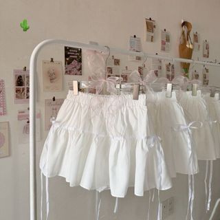 CHÂN VÁY NGẮN RUYBANG CỘT NƠ - NHƯ Ý BOUTIQUE