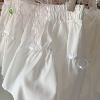 CHÂN VÁY NGẮN RUYBANG CỘT NƠ - NHƯ Ý BOUTIQUE giá sỉ