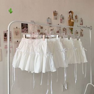 CHÂN VÁY NGẮN RUYBANG CỘT NƠ - NHƯ Ý BOUTIQUE