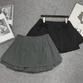 CHÂN VÁY NGẮN XẾP LY ĐÍNH NƠ - NHƯ Ý BOUTIQUE