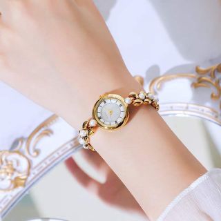 SET ĐỒNG HỒ NỮ NGỌC TRAI CHÍNH HÃNG FUNMEI F20205 TẶNG KÈM HOA TAI CÓ TEM KÍCH HOẠT BẢO HÀNH 1