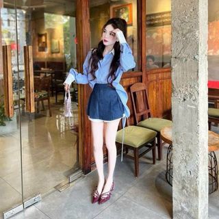 set bộ sơmi có dây rút sau kèm váy có lót, free size duoi 55kg .
