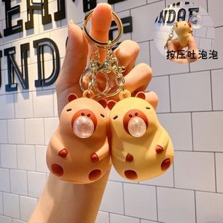 MÓC KHÓA DẺO CAPYBARA THỔI BONG BÓNG